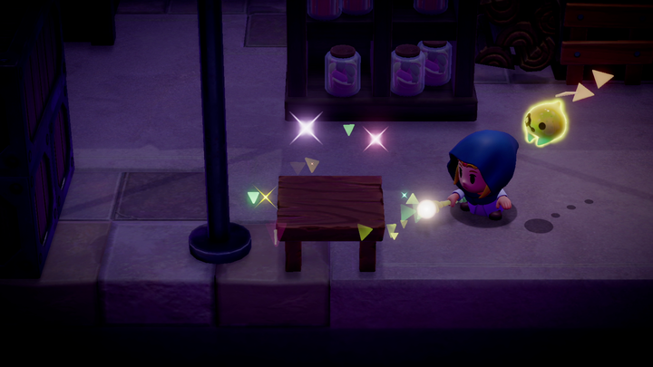 Zelda essayant le bâton des échos sur une table basse (Screenshot - Screenshots du 18 juin 2024- Echoes of Wisdom)
